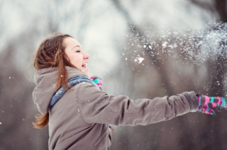 Teenage girl enjoying winter